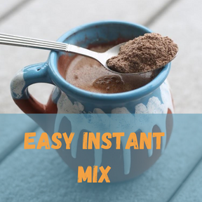 Cup with hot atole with a spoon holding drink mix powder resting on top. The text reads "easy instant mix"